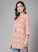 Woman wearing a grey indian kurti for women by Nishtha Chadda