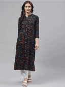 Woman wearing a brown indian kurti for women by Nishtha Chadda