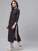 Woman wearing a brown indian kurti for women by Nishtha Chadda