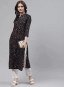 Woman wearing a brown indian kurti for women by Nishtha Chadda