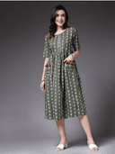 Woman wearing a grey indian kurti for women by Nishtha Chadda