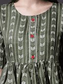 Woman wearing a grey indian kurti for women by Nishtha Chadda