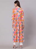 Woman wearing a coral indian kurti for women by Nishtha Chadda
