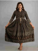 Woman wearing a maroon indian kurti for women by Nishtha Chadda