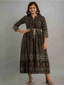 Woman wearing a maroon indian kurti for women by Nishtha Chadda