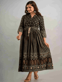Woman wearing a maroon indian kurti for women by Nishtha Chadda