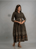Woman wearing a maroon indian kurti for women by Nishtha Chadda