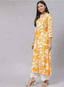Woman wearing a mustard indian kurti for women by Nishtha Chadda