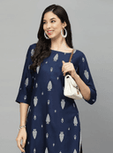 Woman wearing a navy indian kurti for women by Nishtha Chadda