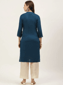 Woman wearing a navy indian kurti for women by Nishtha Chadda