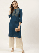 Woman wearing a navy indian kurti for women by Nishtha Chadda