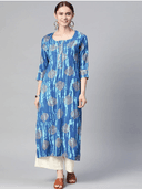 Woman wearing a blue indian kurti for women by Nishtha Chadda