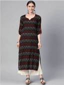 Woman wearing a brown indian kurti for women by Nishtha Chadda