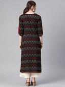 Woman wearing a brown indian kurti for women by Nishtha Chadda