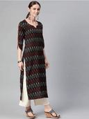 Woman wearing a brown indian kurti for women by Nishtha Chadda