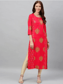 Woman wearing a red indian kurti for women by Nishtha Chadda