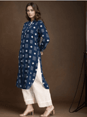 Woman wearing a navy indian kurti for women by Nishtha Chadda