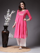 Woman wearing a pink cotton tunic for women by Nishtha Chadda