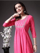 Woman wearing a pink cotton tunic for women by Nishtha Chadda