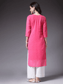Woman wearing a pink cotton tunic for women by Nishtha Chadda
