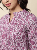 Woman wearing a brown indian kurti for women by Nishtha Chadda