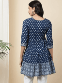Woman wearing a navy indian kurti for women by Nishtha Chadda