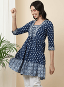 Woman wearing a navy indian kurti for women by Nishtha Chadda