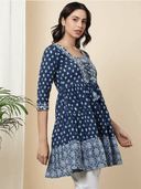 Woman wearing a navy indian kurti for women by Nishtha Chadda