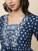 Woman wearing a navy indian kurti for women by Nishtha Chadda