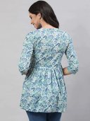 Woman wearing a grey indian kurti for women by Nishtha Chadda