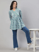 Woman wearing a grey indian kurti for women by Nishtha Chadda