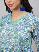 Woman wearing a grey indian kurti for women by Nishtha Chadda
