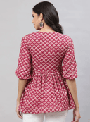 Woman wearing a grey indian kurti for women by Nishtha Chadda