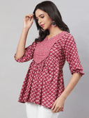 Woman wearing a grey indian kurti for women by Nishtha Chadda