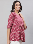 Woman wearing a grey indian kurti for women by Nishtha Chadda