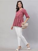 Woman wearing a grey indian kurti for women by Nishtha Chadda