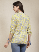 Woman wearing a grey indian kurti for women by Nishtha Chadda