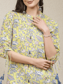 Woman wearing a grey indian kurti for women by Nishtha Chadda