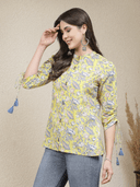 Woman wearing a grey indian kurti for women by Nishtha Chadda