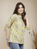 Woman wearing a grey indian kurti for women by Nishtha Chadda
