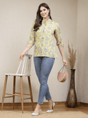 Woman wearing a grey indian kurti for women by Nishtha Chadda