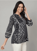 Woman wearing a grey indian kurti for women by Nishtha Chadda