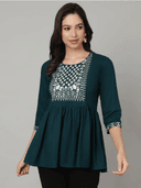 Woman wearing a black indian kurti for women by Nishtha Chadda