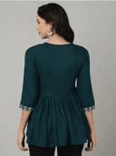 Woman wearing a black indian kurti for women by Nishtha Chadda