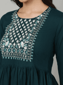 Woman wearing a black indian kurti for women by Nishtha Chadda