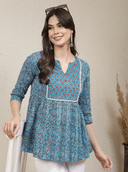 Woman wearing a grey indian kurti for women by Nishtha Chadda
