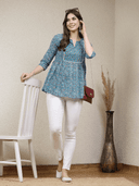 Woman wearing a grey indian kurti for women by Nishtha Chadda