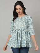 Woman wearing a grey indian kurti for women by Nishtha Chadda