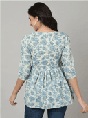 Woman wearing a grey indian kurti for women by Nishtha Chadda