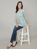 Woman wearing a grey indian kurti for women by Nishtha Chadda